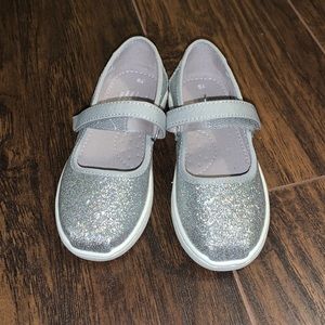 Sparkly silver Tom’s shoes